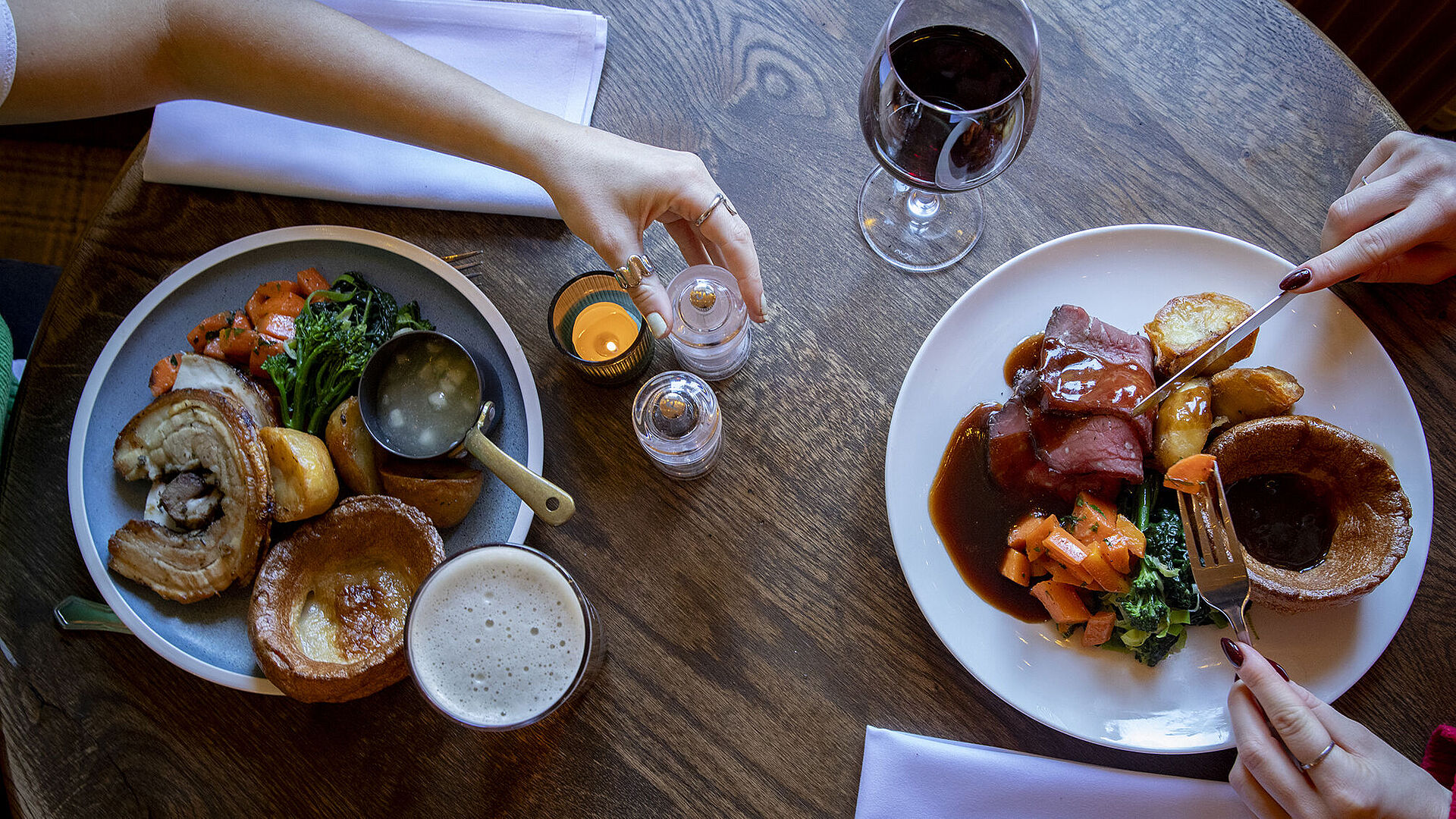 Roast beef and roast pork with potatoes and vegetables
